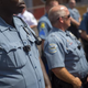 Members of the Ferguson Police Department wear body cameras during a rally Aug. 30, 2014, in Ferguson, Mo. Michael Brown, an 18-year-old unarmed teenager, was shot and killed by Officer Darren Wilson Aug. 9.
Aaron P. Bernstein/Getty Images